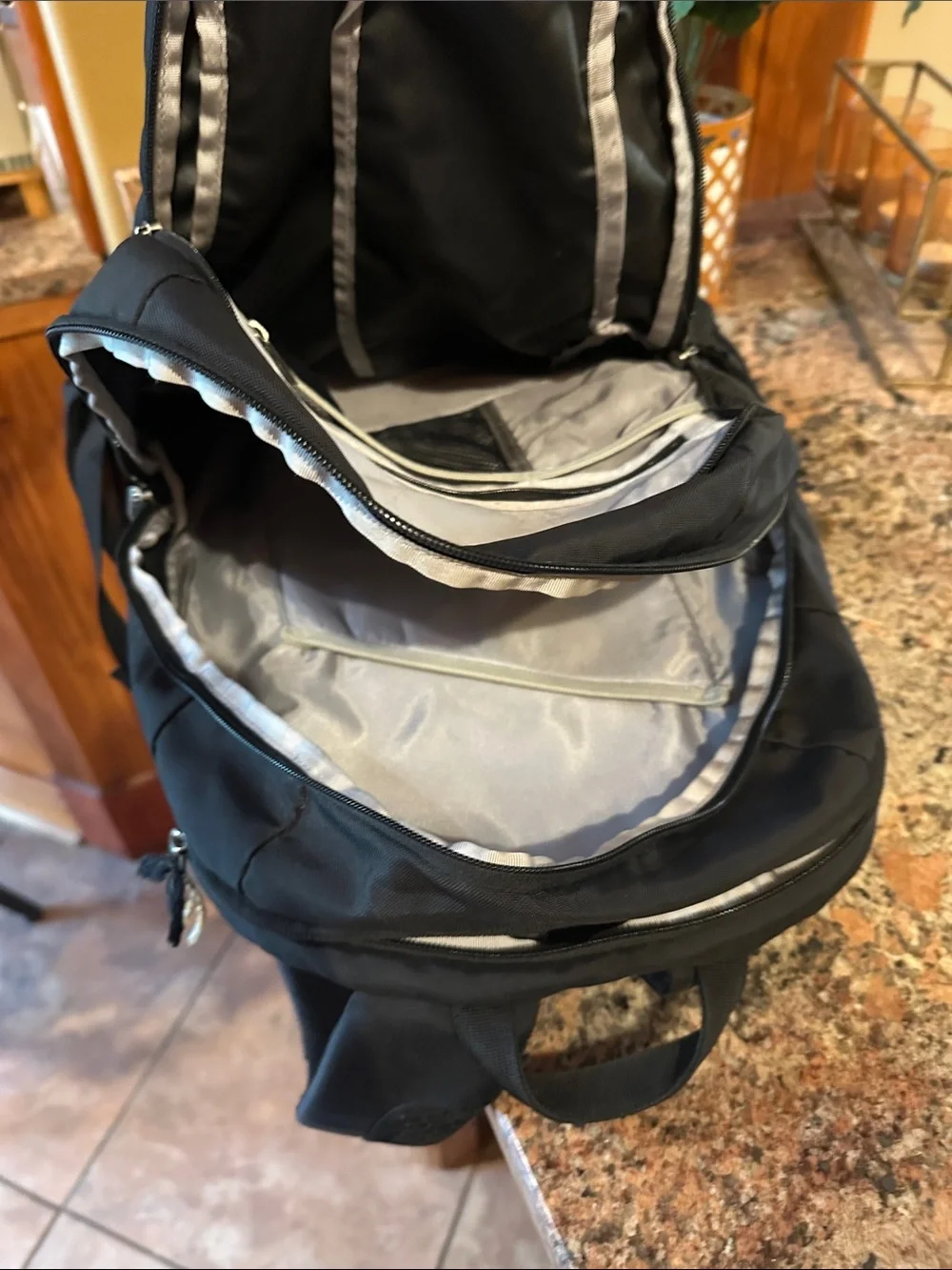 Patagonia Black Backpack with Gray Bungee Cord